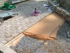 Leveling the sand for the pavers